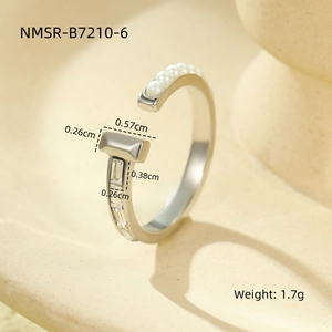 Detail view of pearl and crystal stainless steel ring with dimensions 0.57cm and weight 1.7g