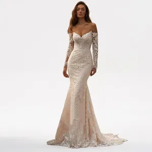 Slim fit ivory lace mermaid wedding dress with off-shoulder neckline and long sleeves