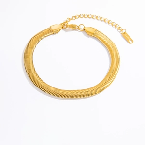 Detailed macro view of 18k gold plated stainless steel snake chain with lobster clasp