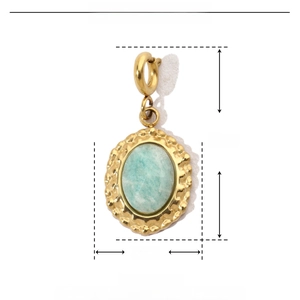 Detail showing natural green stone pendant with dimensions of 21mm by 10mm in gold frame