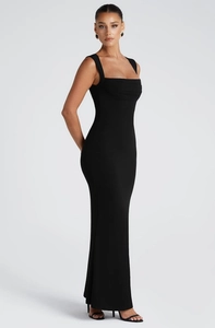 Close-up of elegant black square neck sleeveless maxi dress with slim fit tailoring