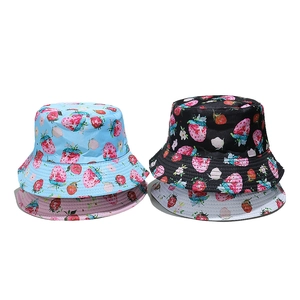Reversible strawberry and floral print bucket hats for sun protection in four colors