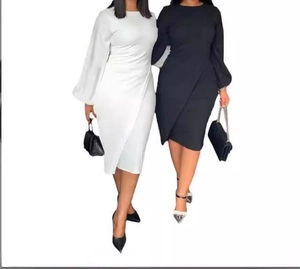 Detail view of stylish long lantern sleeve dresses featuring waist pleats and side slits