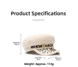 Detail view of cream sherpa military cap with leopard trim and golden M initial