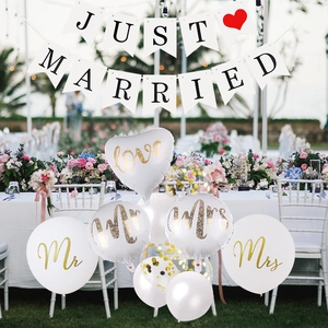 Just Married banner with gold heart balloons for outdoor wedding party decor