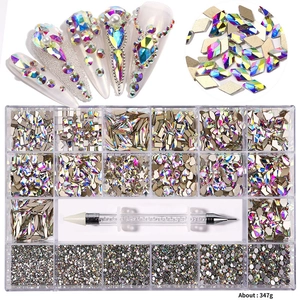 Detail of 21-compartment nail art rhinestone set with dual-ended dotting pen and AB crystals