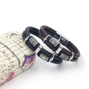 Nordic Viking woven leather bracelets in black and brown with Celtic knot silver beads