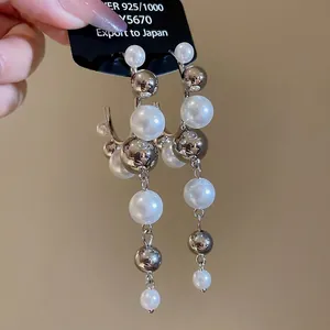 Elegant 925 sterling silver geometric C-shape pearl tassel earrings with high-end style