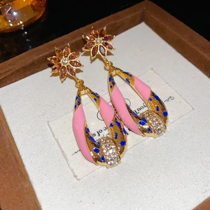 Vintage gold flower earrings with pink enamel and sparkling crystals in a gift box