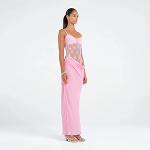Detail of a pink sheer lace dress featuring high-waisted design and slim silhouette