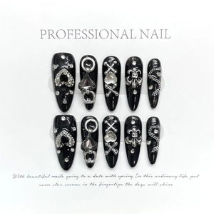Dark gothic black press-on nails set with silver heart and cross metal charms