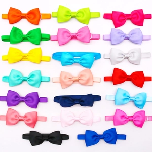 Detailed grid of adjustable pet bow ties in various vibrant colors and ribbed texture