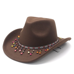 Dark brown wool felt western cowboy hat with colorful ethnic beaded band and tassels