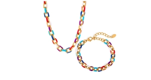 Detailed shot of gold titanium necklace and bracelet set with colorful enamel charms