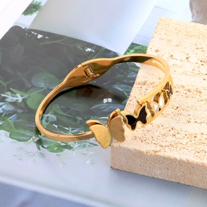 Golden butterfly open bangle bracelet with hinge design and shell inlay decorations