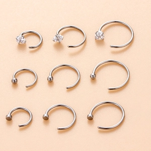 9pcs set of stainless steel C-shaped nose rings with zircon, bead and flat disk designs