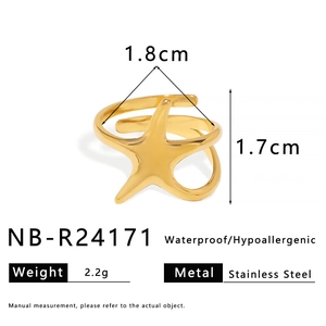 Detail showing golden starfish ring size 1.8cm by 1.7cm in polished stainless steel