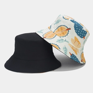 Dual-sided bucket hat with creative tropical durian print and classic solid black design