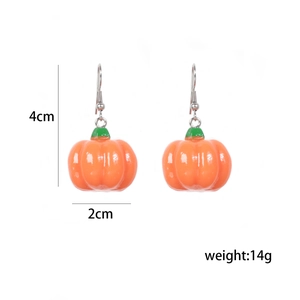 Detailed size view of orange pumpkin earrings showing 4cm height and 2cm width
