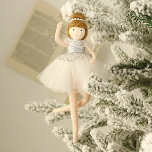 Charming ballet girl plush angel doll ornament hanging on a snowy Christmas tree branch