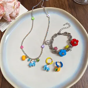 Colorful stainless steel jewelry set with elephant pumpkin charms and pearls