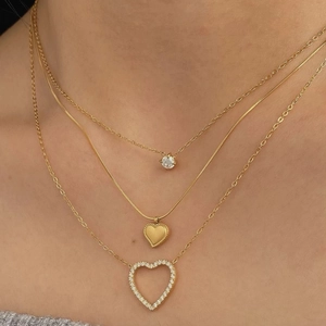 Three-layer gold stainless steel necklace with heart pendants and sparkling crystals