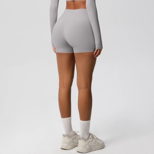 Rear view of light grey high-waisted seamless yoga shorts showing lifting effect