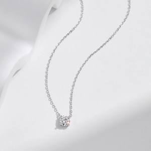 Minimalist s925 silver necklace featuring a sparkling round moissanite pendant on O-chain