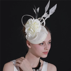 Elegant white fascinator hat with rose flower feathers and mesh veil for weddings