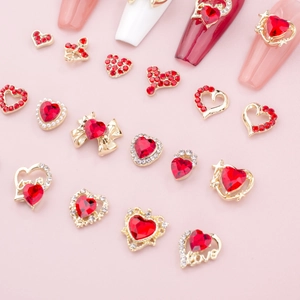 Red heart nail charms and gold bow accessories set for festive DIY manicure decoration