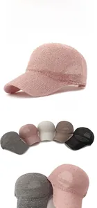 Close-up of sequin mesh texture and breathable weaving on a stylish summer baseball cap