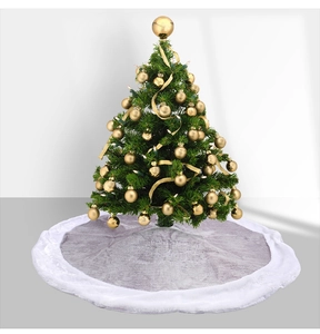 Detail of grey plush Christmas tree skirt with white faux fur border for holiday decor