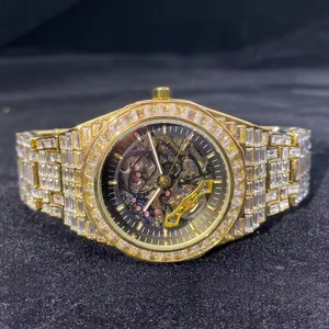 Luxurious gold iced-out mechanical watch with full diamond setting and skeleton dial