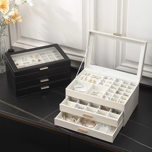 Multi-layer luxury jewelry box with glass lid and drawers in black and beige finishes