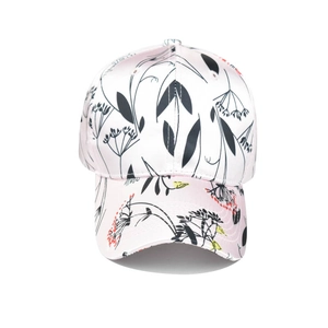 Detailed view of pink baseball cap featuring elegant floral print and smooth satin texture