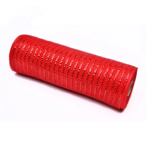 Macro detail of red poly deco mesh roll with metallic gold wire for Christmas DIY decor