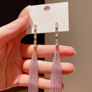 Elegant gold zircon tassel earrings with purple crystals and fine chain droplets