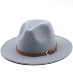 Detail showing light grey wool fedora hat with brown leather band and gold buckle