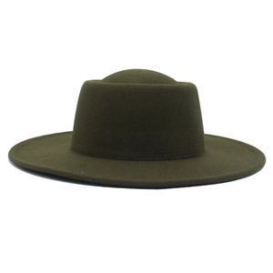 Detailed view of the dark olive green wool felt wide brim fedora hat with a round crown