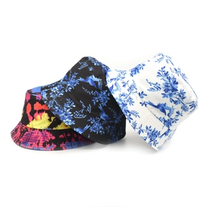 Three patterned fisherman bucket hats for outdoor sun protection in various floral prints