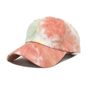 Side view of a tie-dye baseball cap in pastel peach, orange, and green on white background