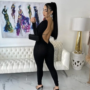 Detailed back view of a black sequined backless jumpsuit with long sleeves and tight fit