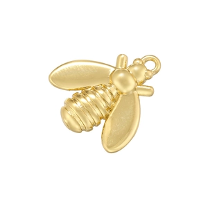 Detailed view of a golden metallic bee charm with a top loop for DIY jewelry making