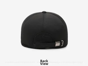 Rear view of black wool baseball cap featuring adjustable fabric strap and silver buckle