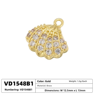 Detail of gold seashell charm with clear zircons, brass material, 12.5mm by 13mm size