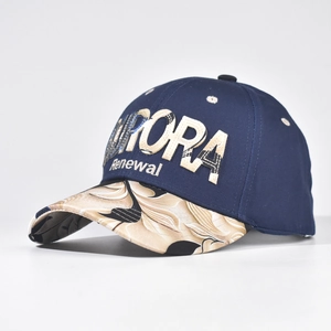 Detail of embroidered AURORA text and floral pattern brim on navy cotton baseball cap