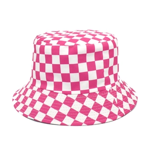 Pink and white checkerboard cotton bucket hat with reversible wide brim design