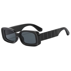 Modern rectangular sunglasses with bold black frames and unique geometric wide temples