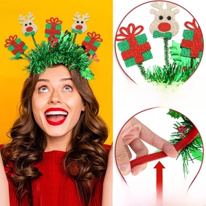 Detail of stretchy Christmas headband with glitter reindeer and gift box decorations