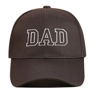Close-up of DAD embroidery and cotton twill texture on a brown vintage baseball cap